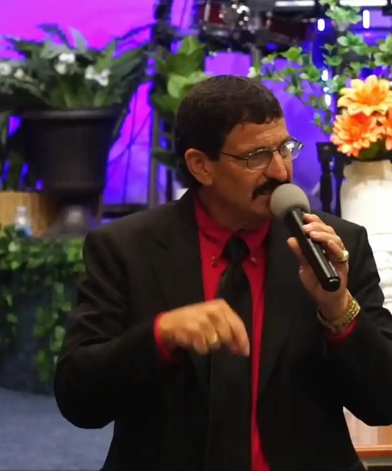 Pastor Jessie in action, delivering a sermon
